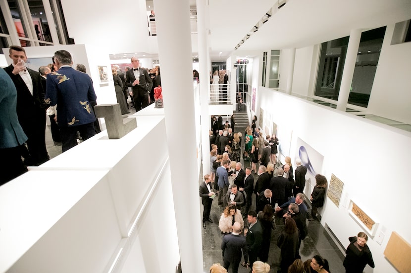 A crowd gathers inside the Rachofsky house for the 2017 gala, Two x Two for AIDS and Art.