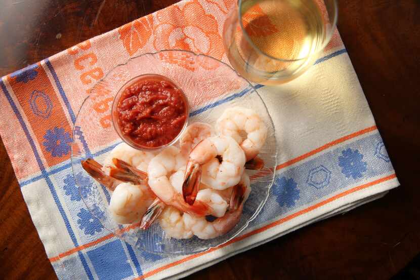 Texas gulf shrimp cocktail paired with wine. (Rose Baca/Staff Photographer) 
