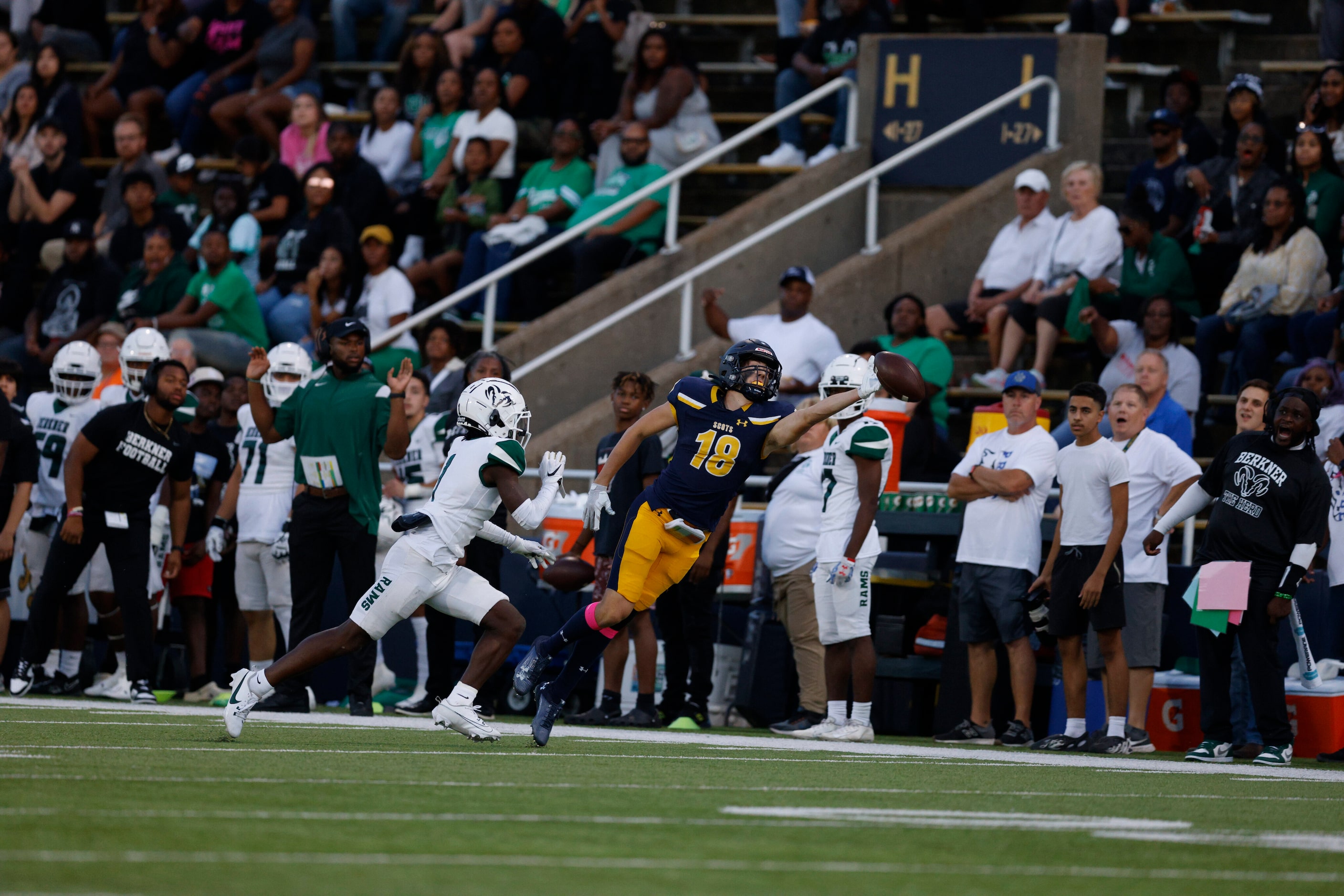 Highland Park wide receiver Charles Schneider (18) fails to complete a one-handed catch...