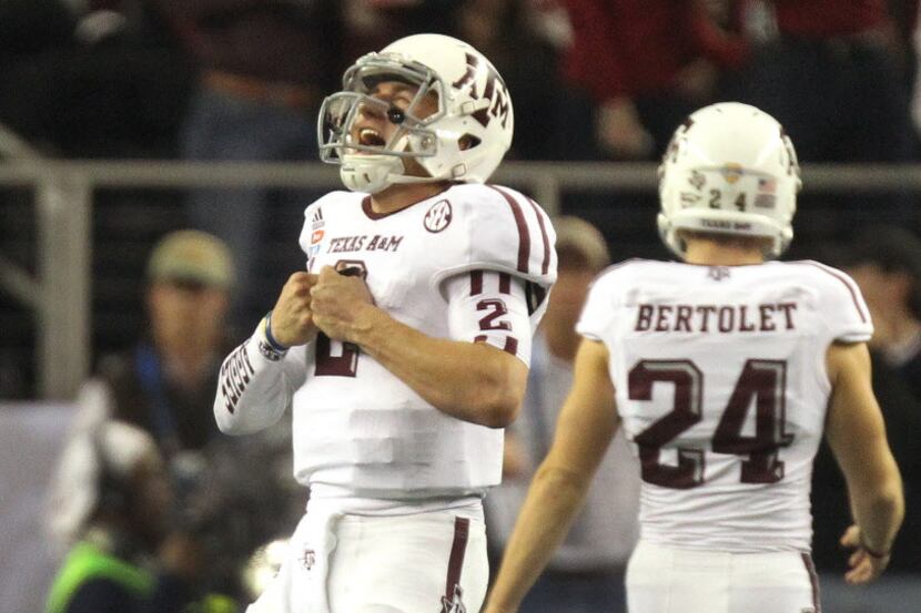 Texas A&M quarterback Johnny Manziel is pictured during third quarter play in the 77th AT&T...
