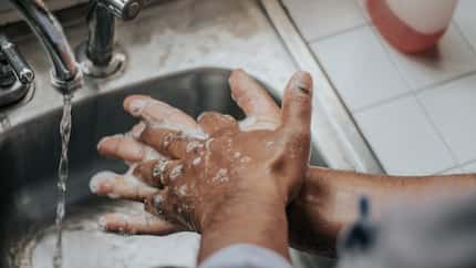 A man washing his hands