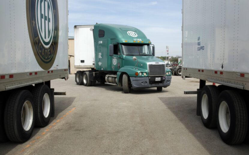 A student makes a sharp turn to pull between two trailers during the training session at FFE...