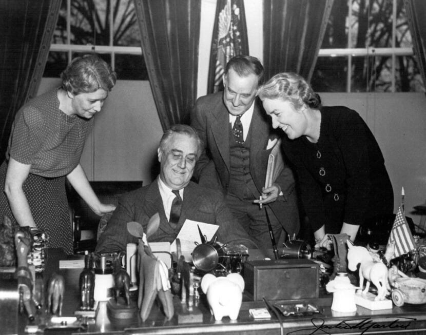 President Franklin Roosevelt at his desk in the White House on May 22, 1941. He set the pace...