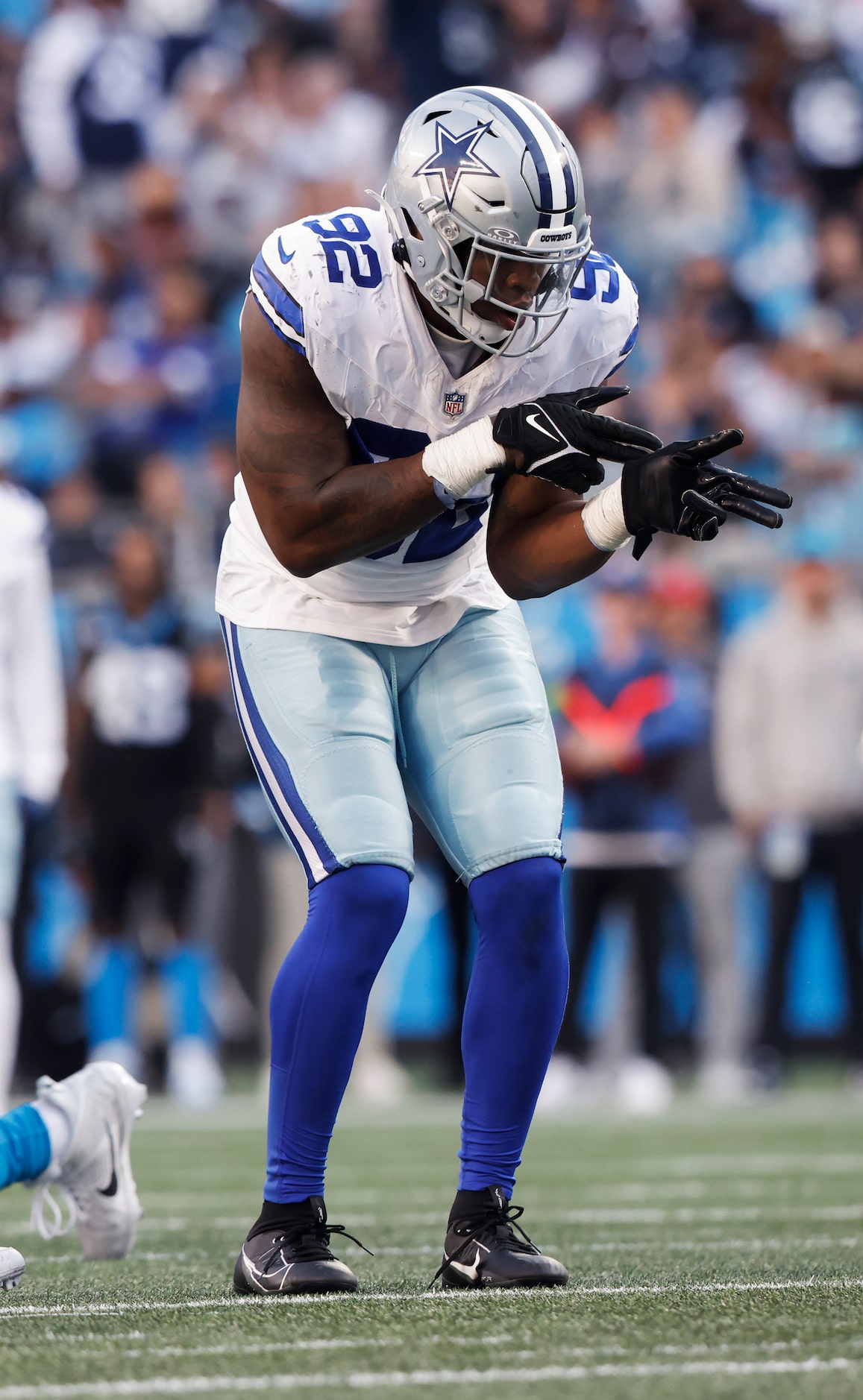 Dallas Cowboys defensive end Dorance Armstrong (92) celebrates after sacking Carolina...