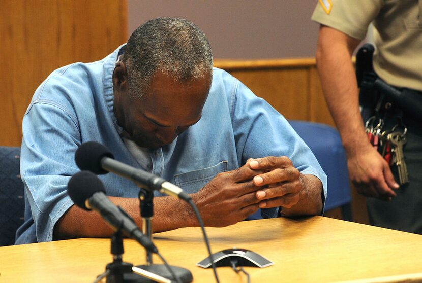 In this July 20, 2017, file photo, O.J. Simpson reacts after learning he was granted parole...