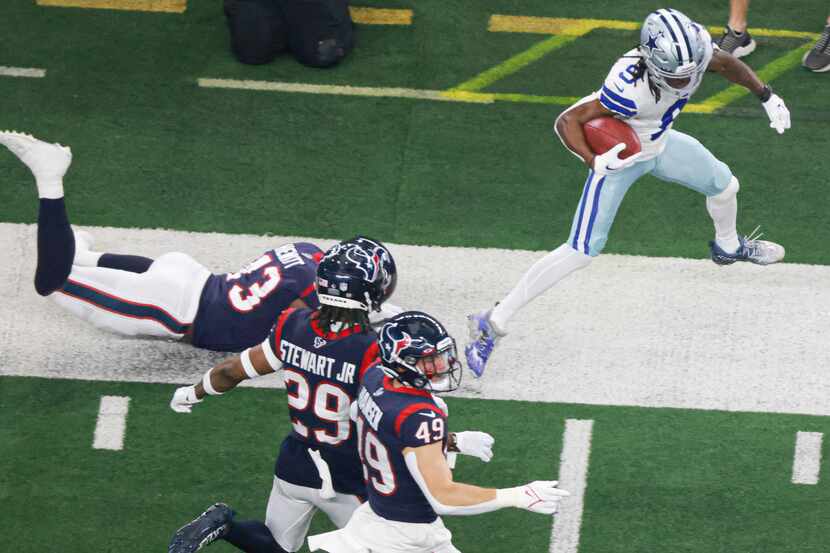 Dallas Cowboys wide receiver KaVontae Turpin (9) runs out of bounds as Houston Texans...