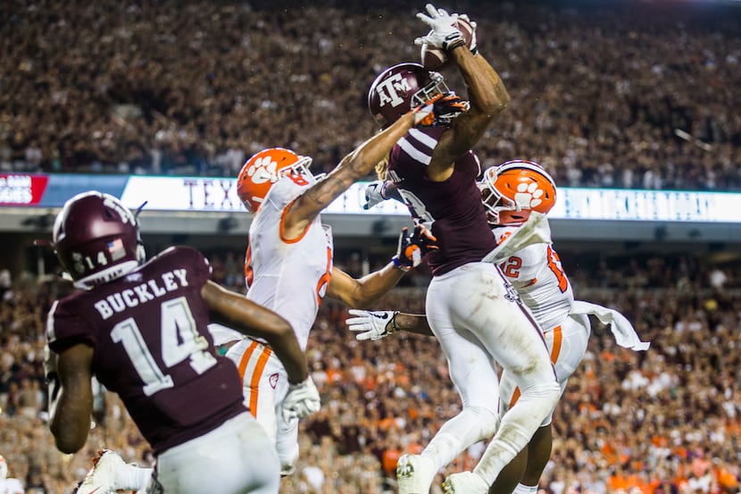 FILE - Texas A&M Aggies wide receiver Kendrick Rogers (13) catches a pass in the end zone...