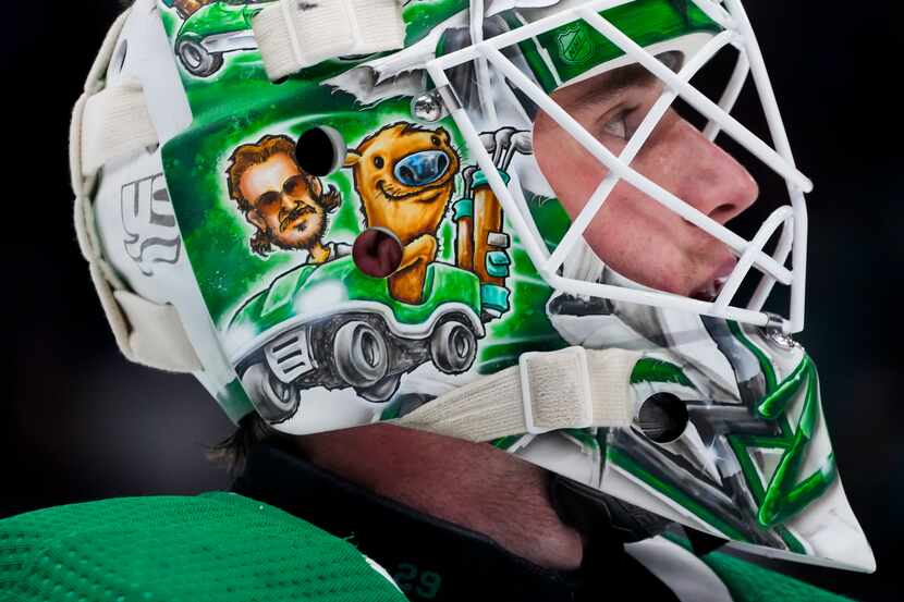 Dallas Stars goaltender Jake Oettinger looks up during a stoppage in play during the third...