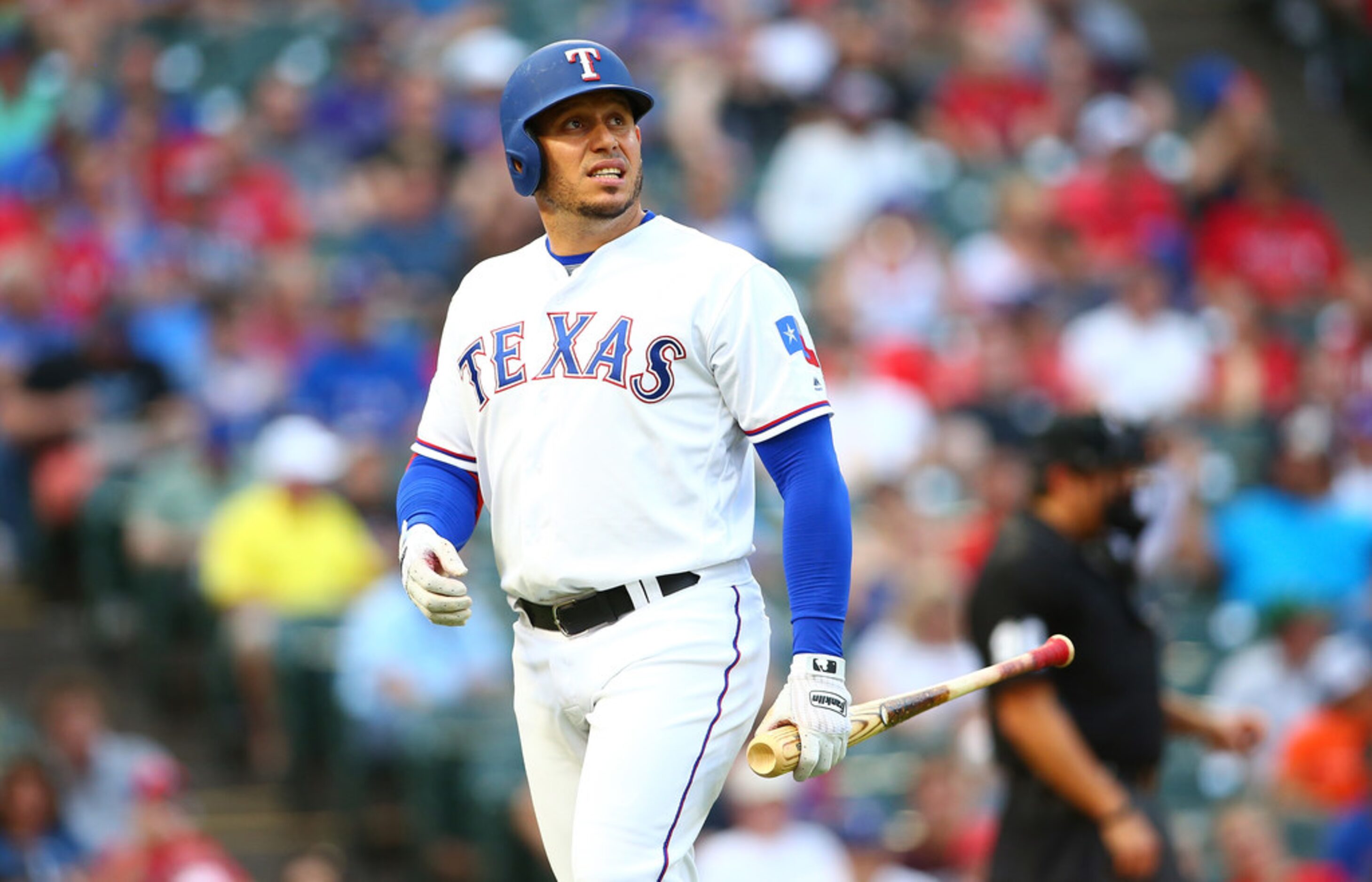 ARLINGTON, TX - JUNE 04:  Asdrubal Cabrera #14 of the Texas Rangers reacts walking to dugout...