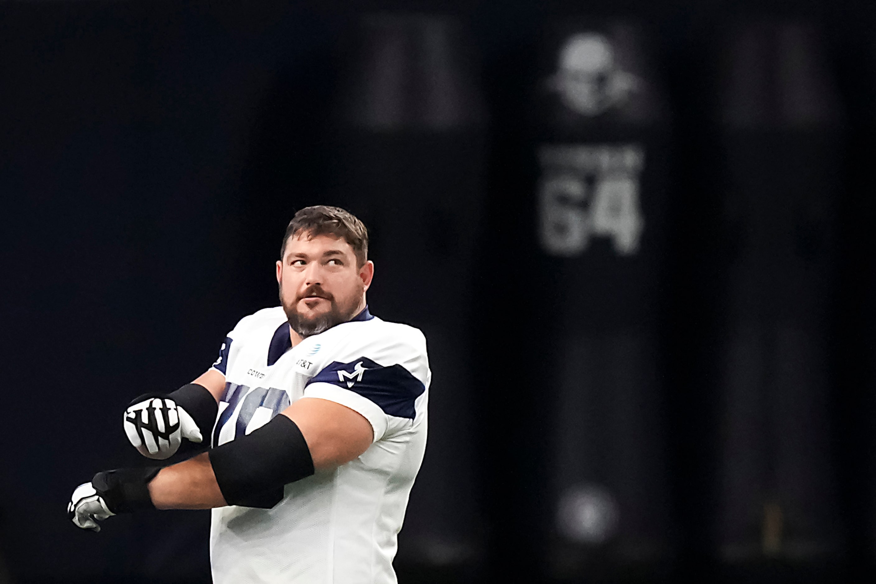 Dallas Cowboys offensive lineman Zack Martin stretches during the team’s first public...