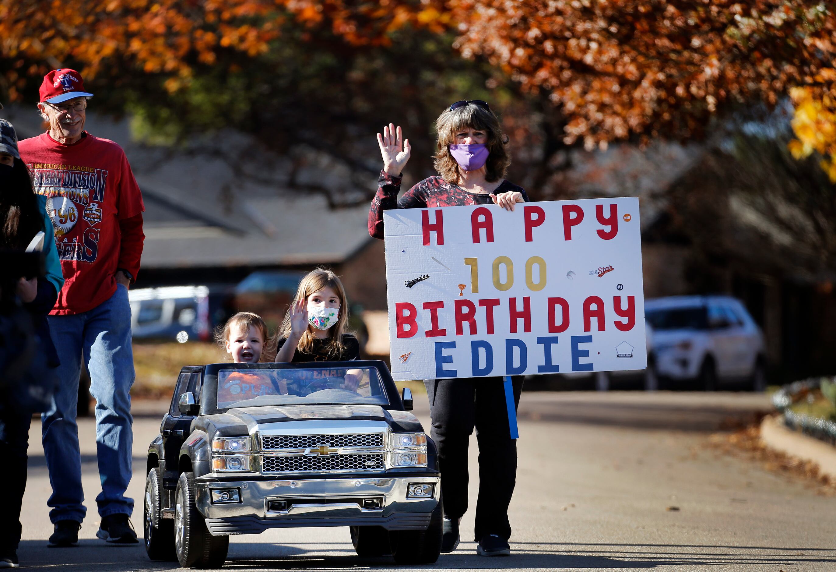 Clayton and Aubrey Myles along with their grandmother Pam Lay (right) drive to Eddie...