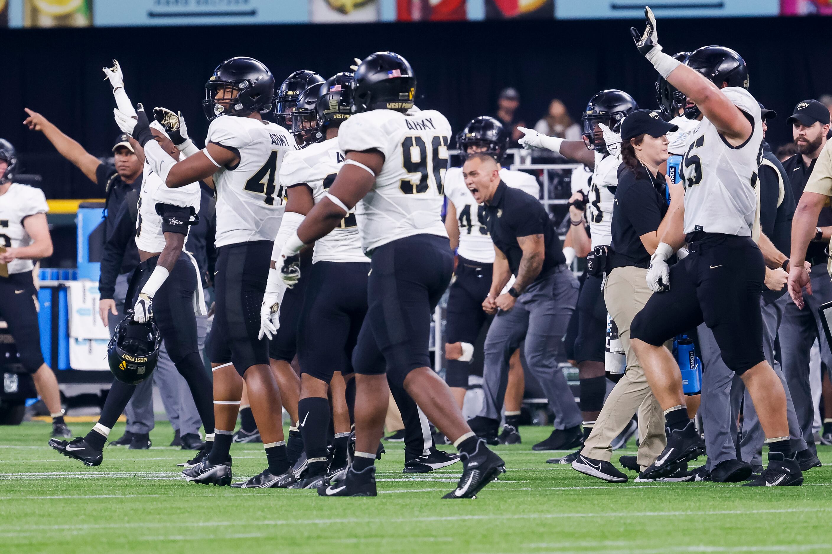 Army Black Knights celebrate an Air Force Falcons fourth down during the second quarter of...