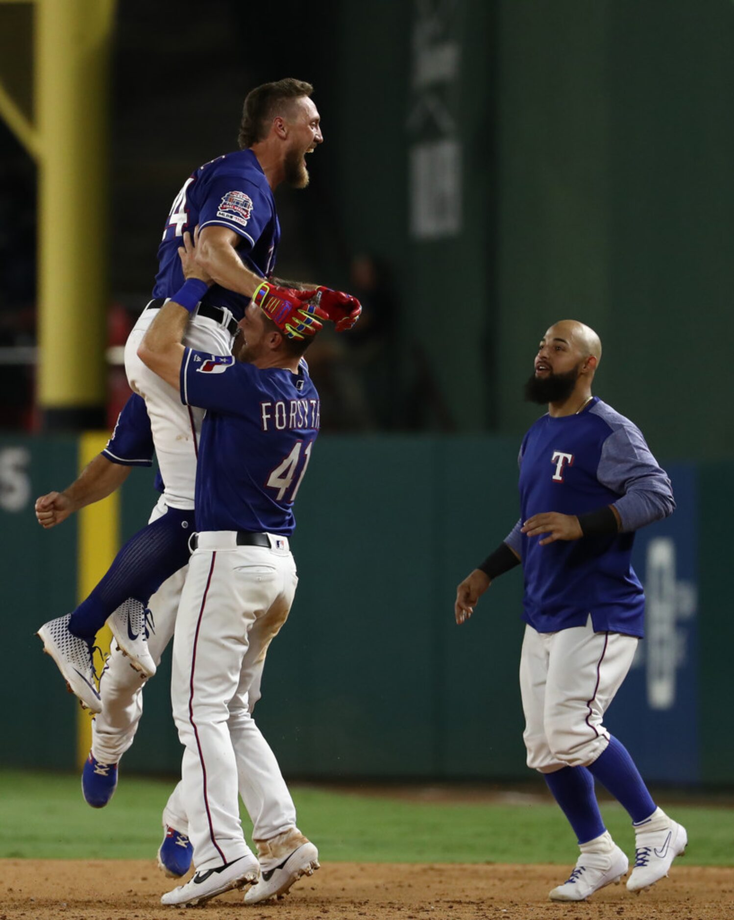 ARLINGTON, TEXAS - AUGUST 21:  Hunter Pence #24 of the Texas Rangers celebrates a walk off...