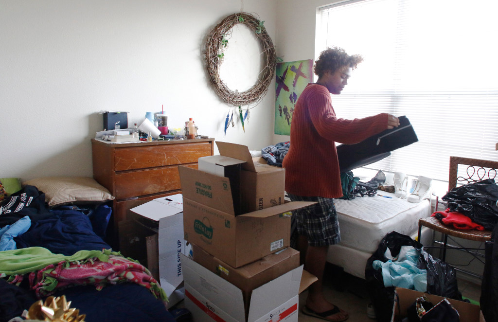Channon Thompson, 18, packs up his belongings in his room at the La Buena Vida House, 200...