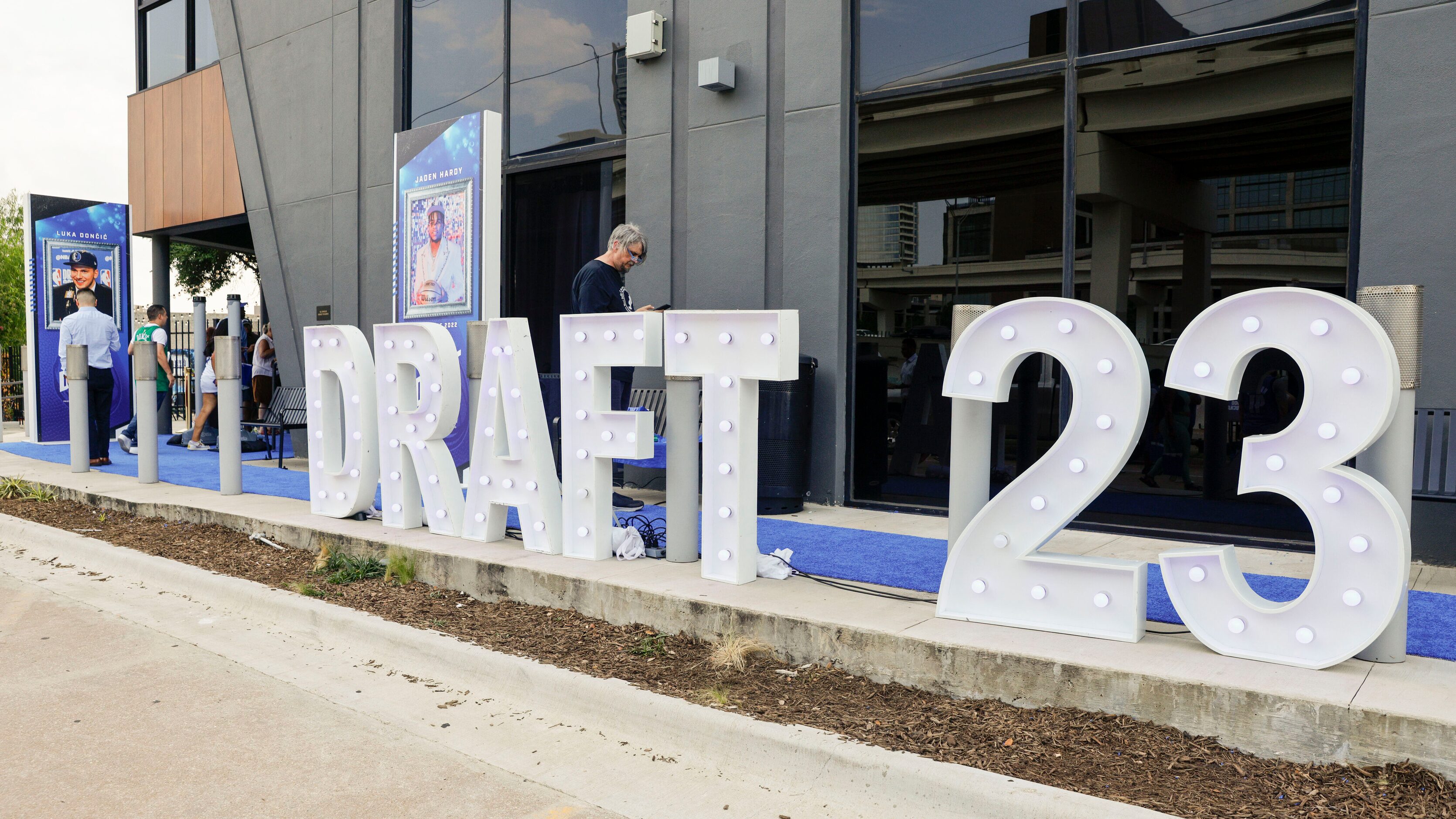 Fans make their way to a Dallas Mavericks 2023 NBA Draft watch party at The Echo Lounge &...