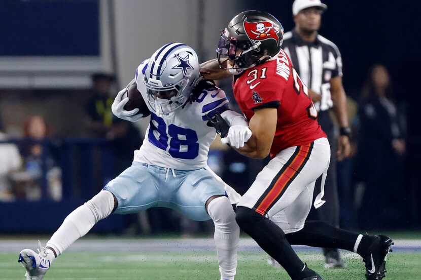 Dallas Cowboys wide receiver CeeDee Lamb (88) is tackled by Tampa Bay Buccaneers safety...