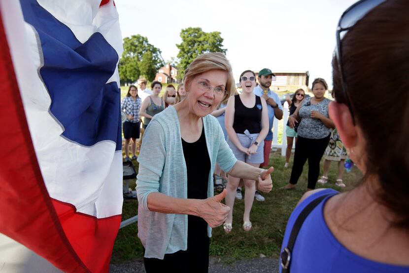  In this July 8, 2018, file photo, Sen. Elizabeth Warren, D-Mass., greets people following a...