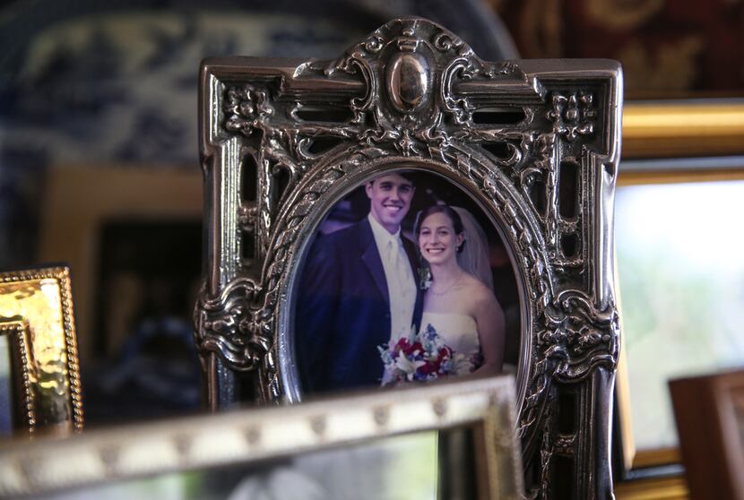 A wedding photo of Beto O'Rourke and his wife, Amy Hoover Sanders, is seen in the home of...