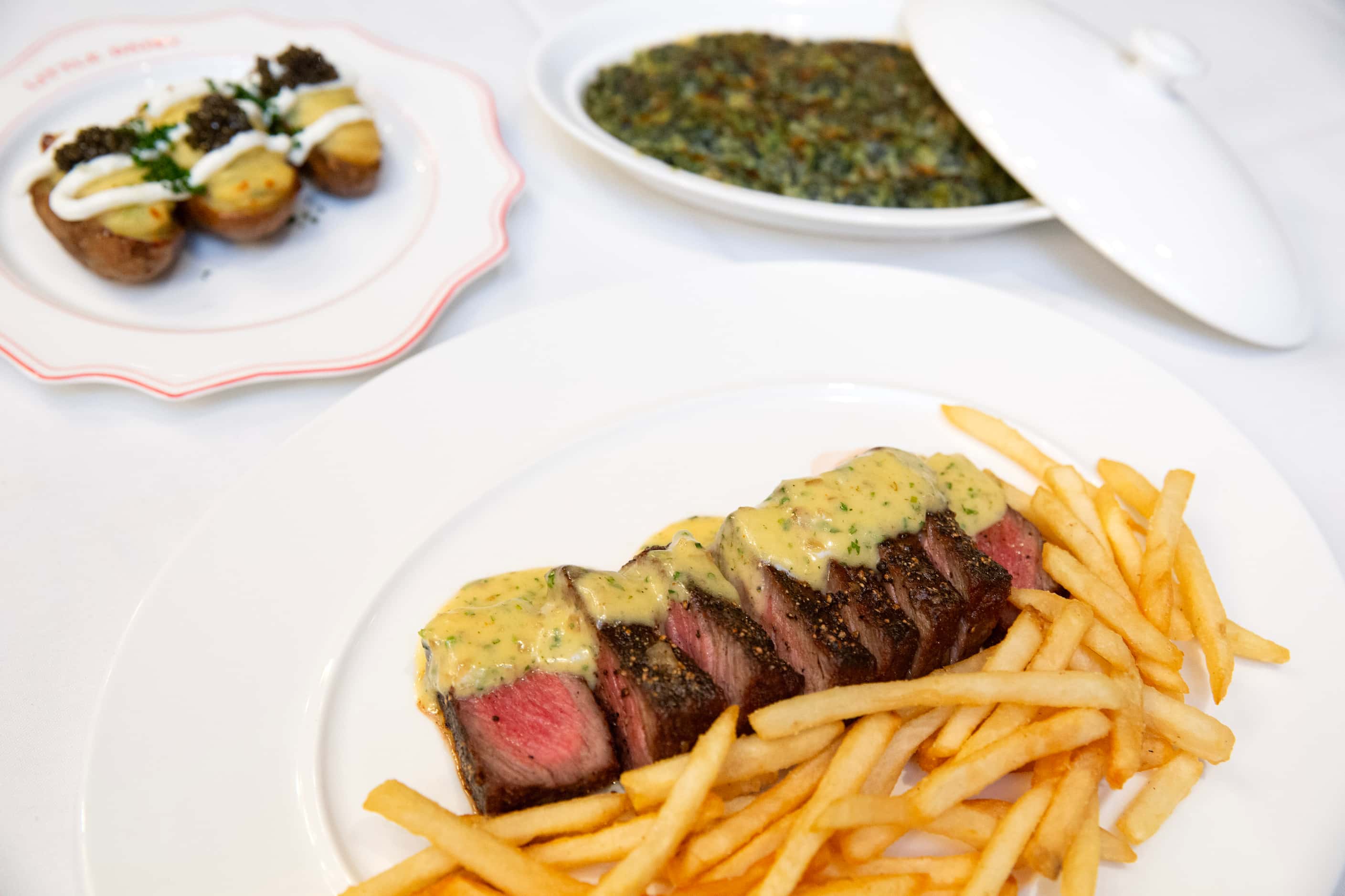 Little Daisy's steak frites can come with Snake River Wagyu. Sides include creamed spinach...