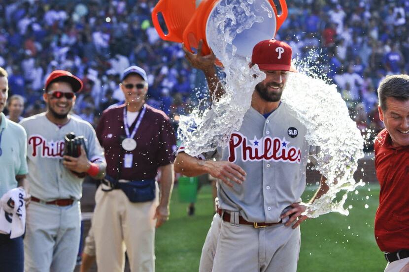 Philadelphia Phillies starter Cole Hamels gets doused after pitching a no-hitter against the...