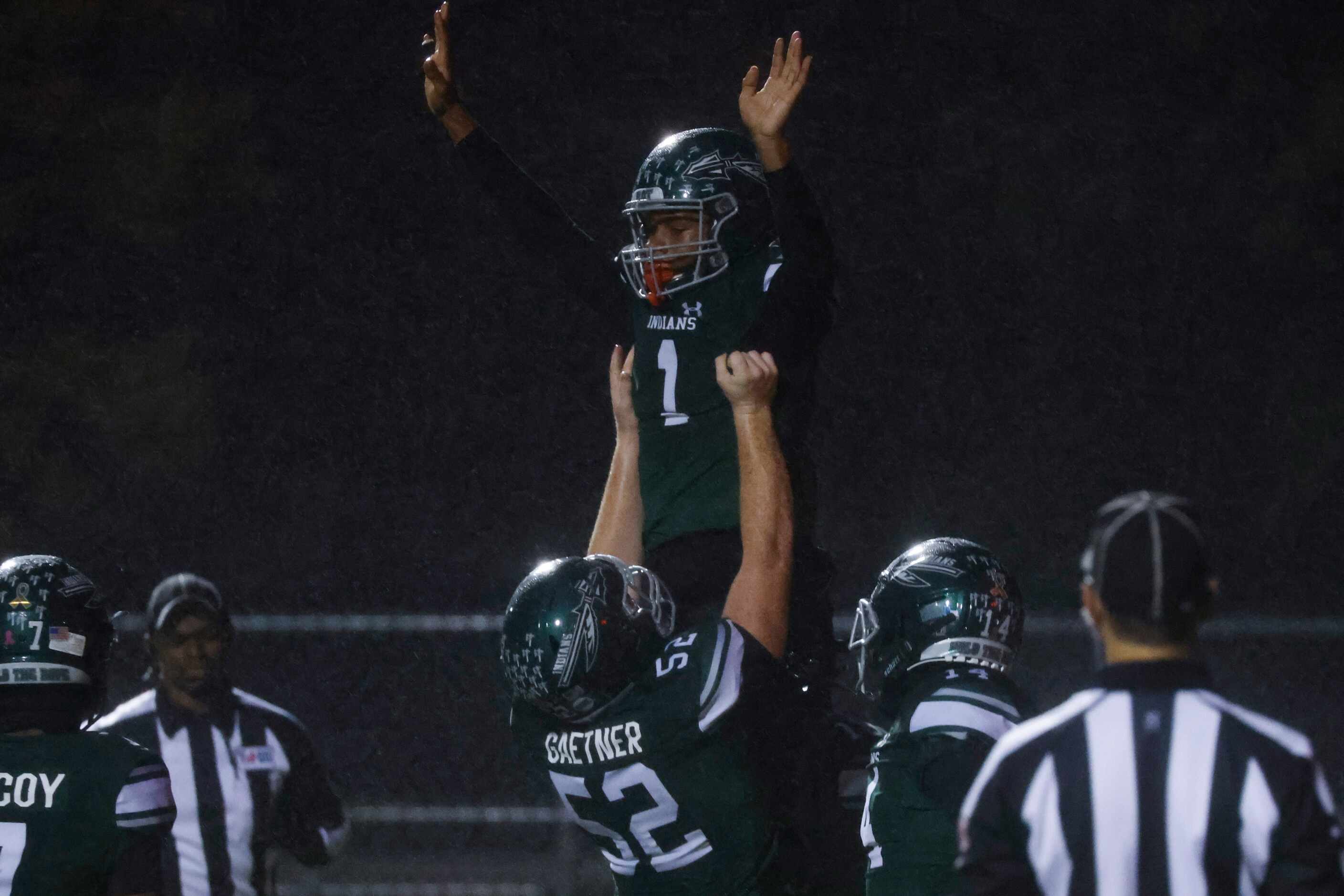 Waxahachie High School’s Keith Abney II (1) celebrates a touchdown against Mansfield Lake...