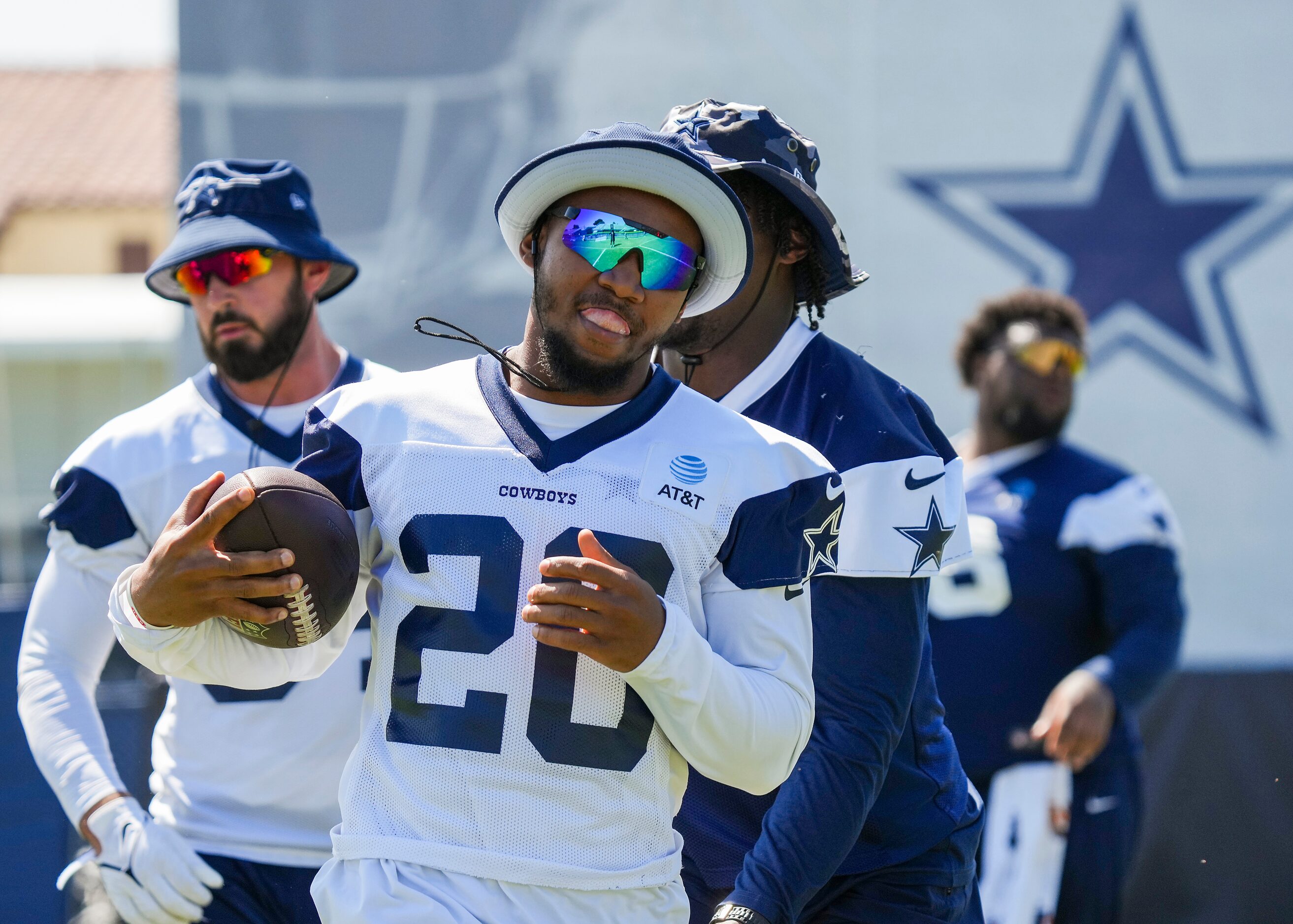 Dallas Cowboys running back Tony Pollard (20) carries the ball during a training camp...