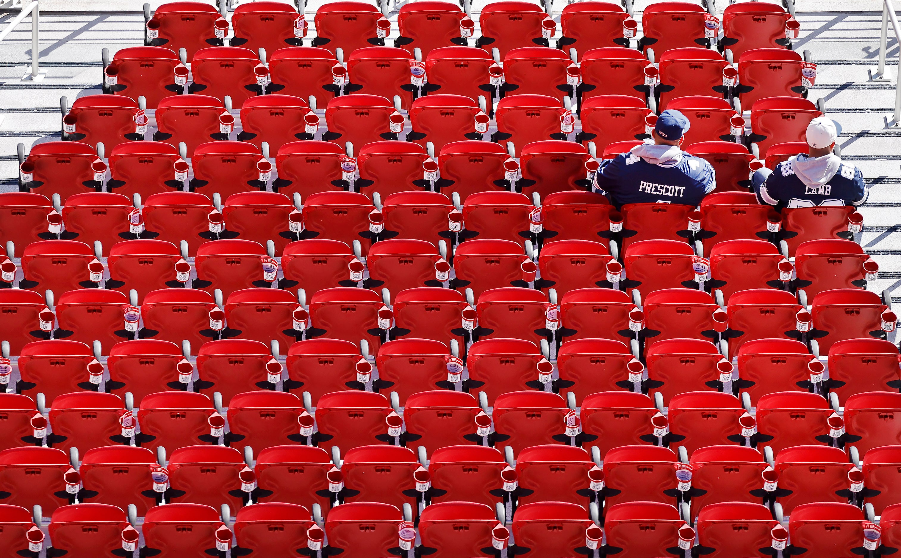 A pair of Dallas Cowboys fans got to their seats early at  Levi’s Stadium in Santa Clara,...