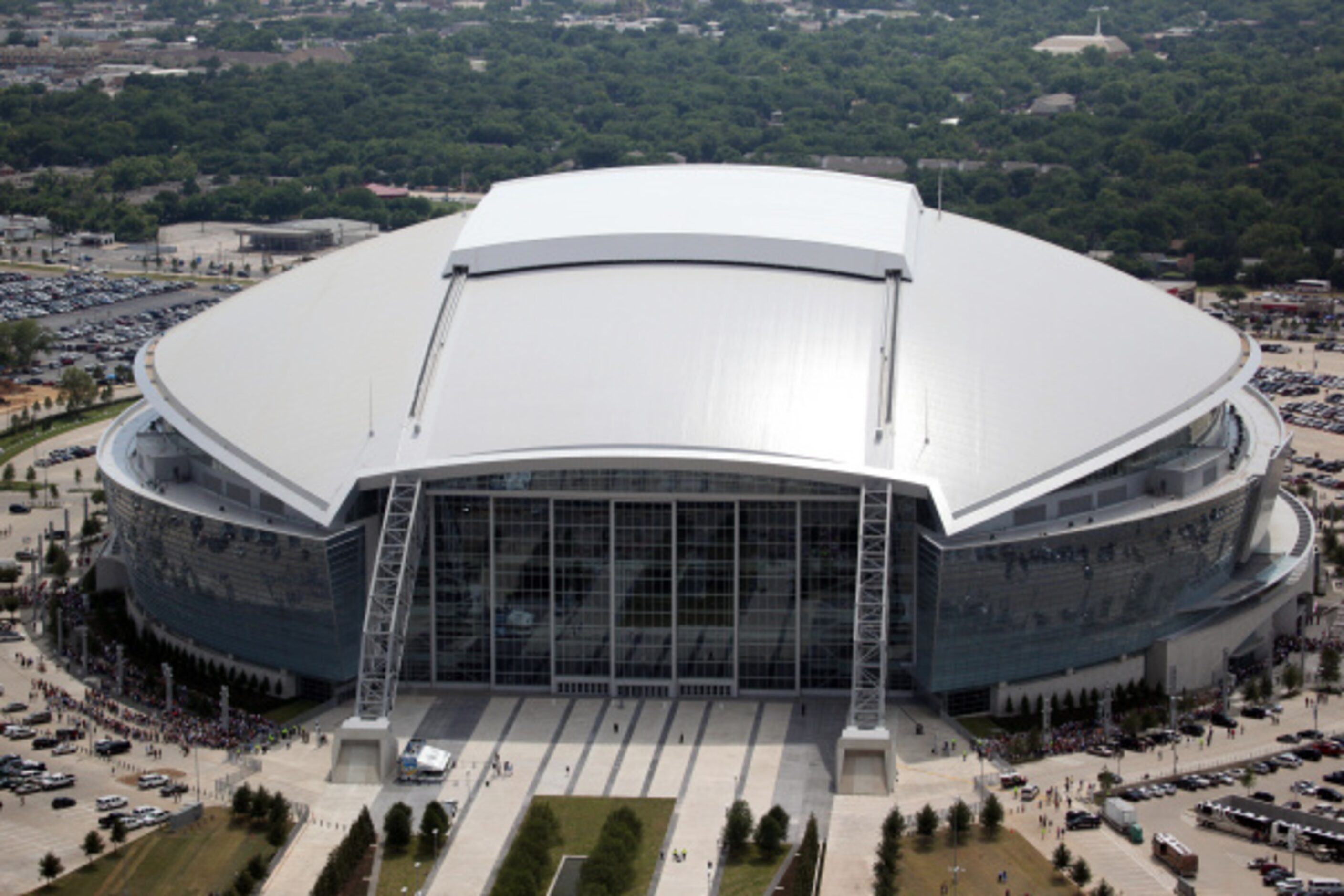 PURE DALLAS EXPERIENCE -- Cowboys Stadium, Jerry Jones’ ginormous football-shaped paean to...