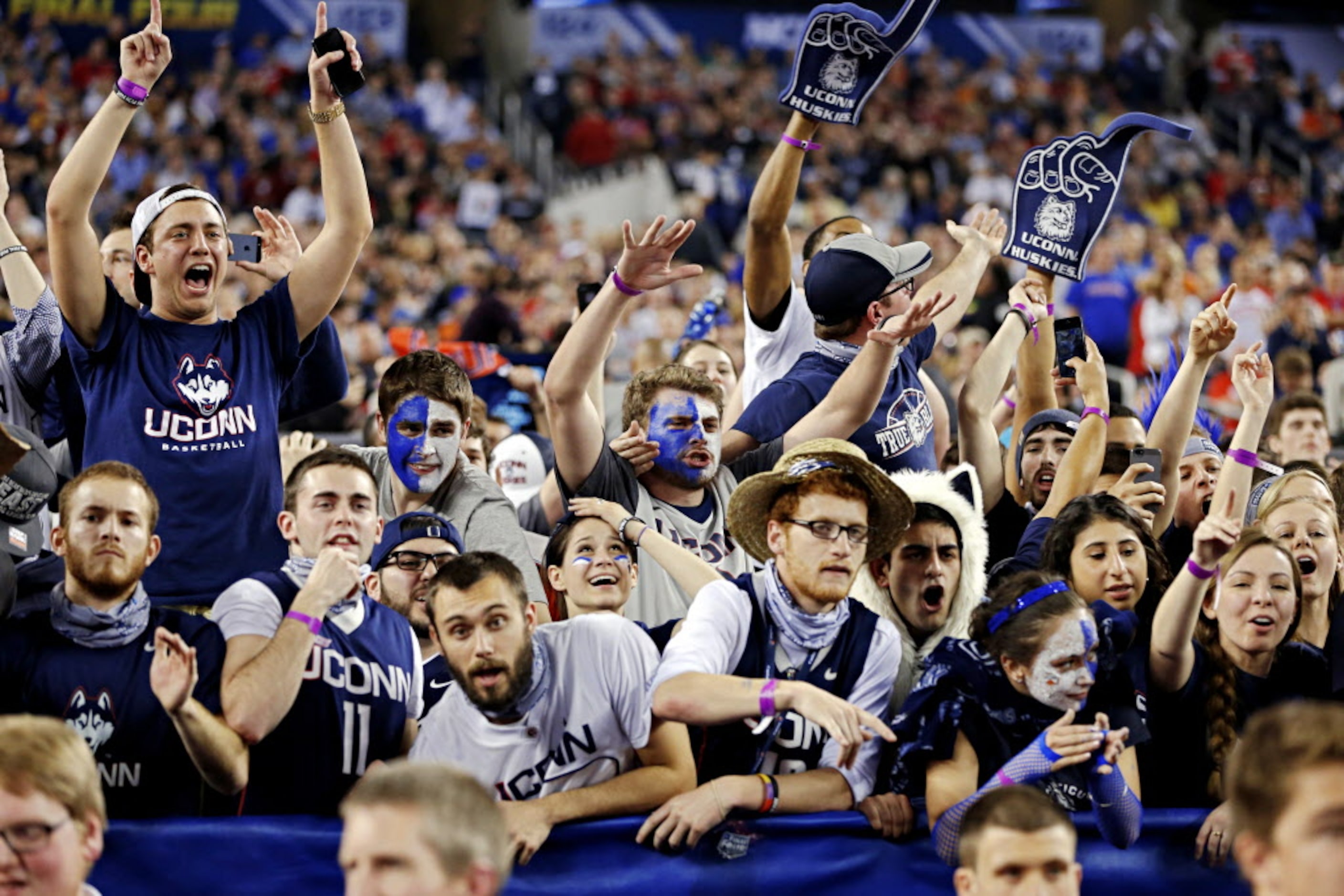 Connecticut Huskies fans react to their win over the Florida Gators during during the NCAA...