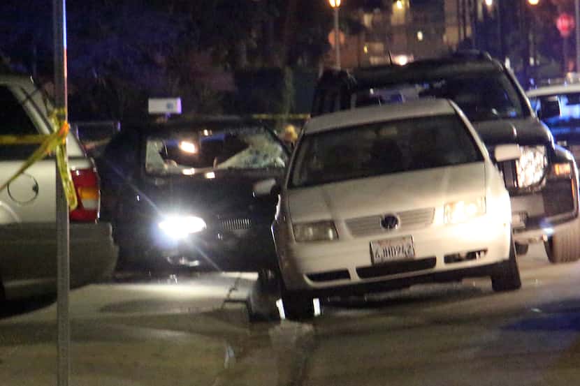 In this image provided by KEYT-TV, a car window is shot out after a mass shooting near the...