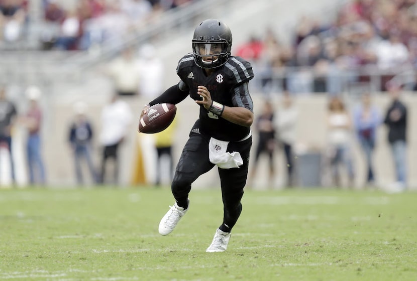 Texas A&M quarterback Kyler Murray (1) runs in the open field against South Carolina during...