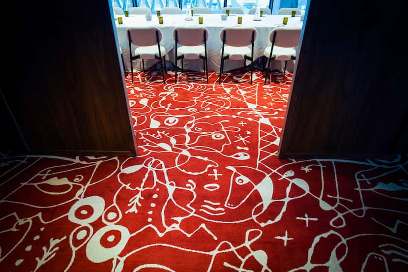 Texas themed carpet runs into a meeting room at the new Virgin Hotels Dallas.