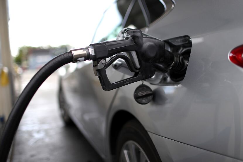 SAN RAFAEL, CA - MAY 10:  A gas pump fills a car with fuel at a gas station