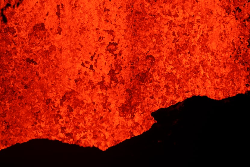 Lava erupts from a fissure in Kapoho, Hawaii, Monday, May 21, 2018. The eruption of Kilauea...