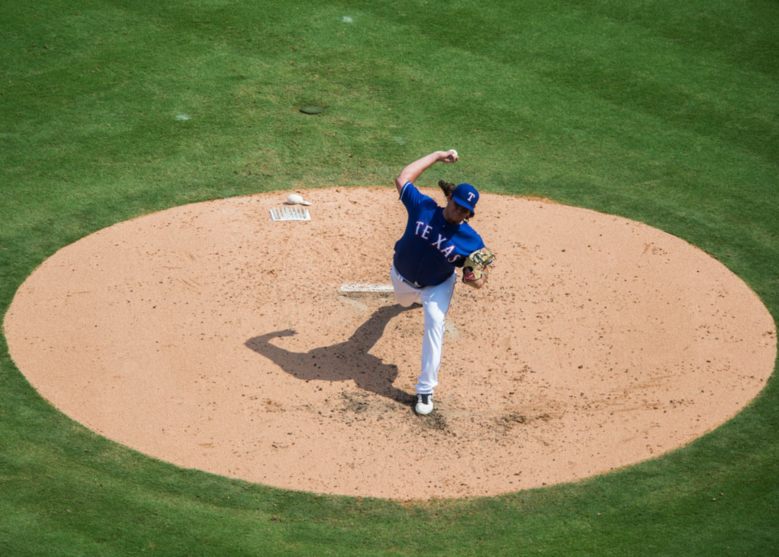 Texas Rangers relief pitcher Ian Gibaut (63) pitches during the fourth inning of an MLB game...