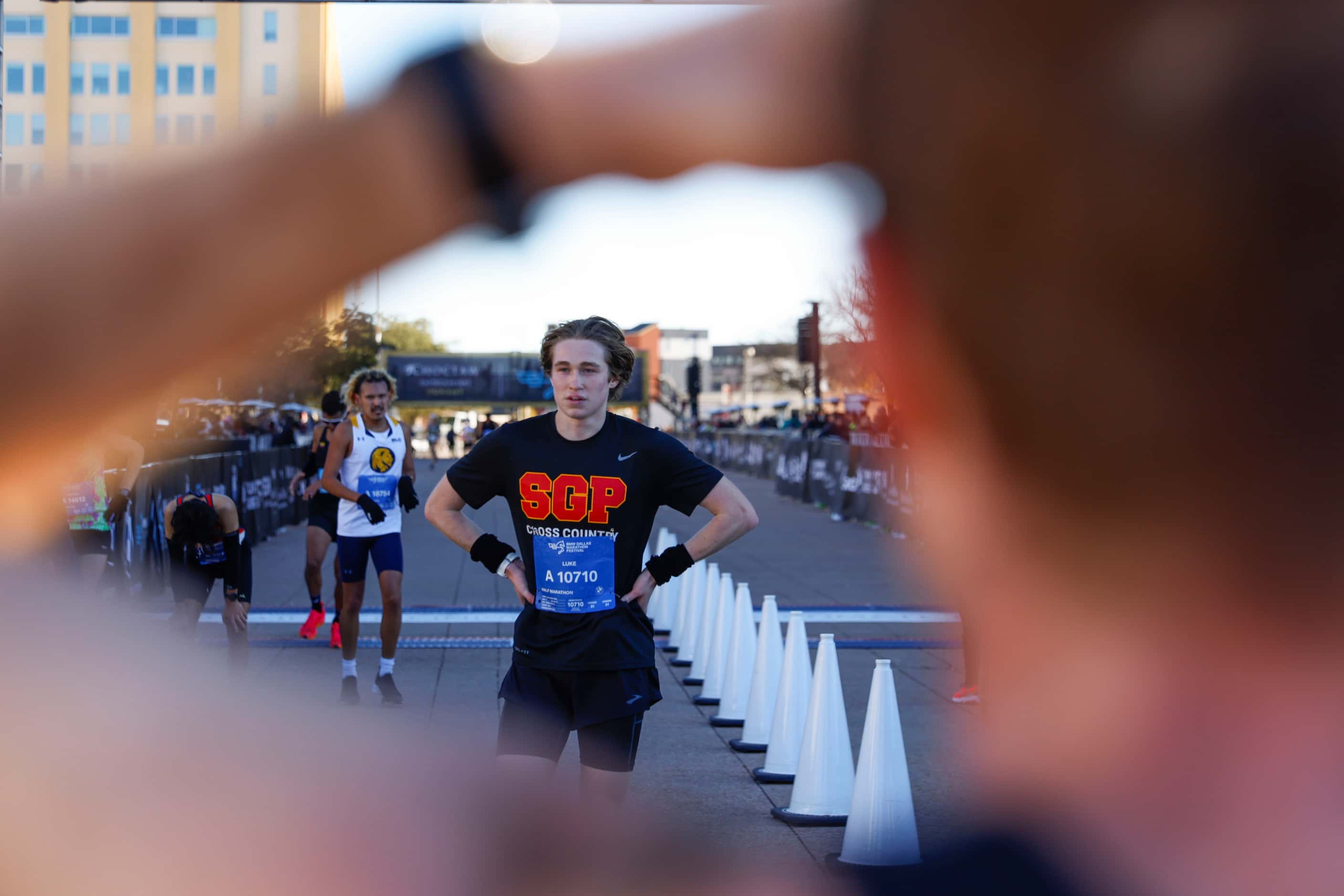 Half marathon runners arrives at the finishing line during 2023 BMW Dallas Marathon on,...