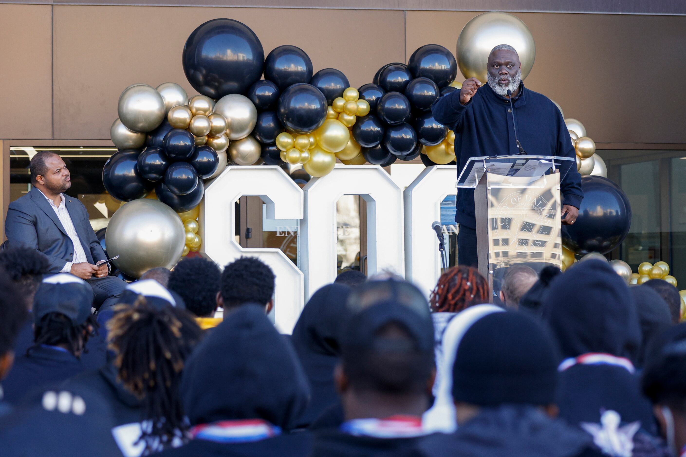 Former Dallas Cowboy Russell Maryland speaks during a ceremony recognizing South Oak Cliff’s...