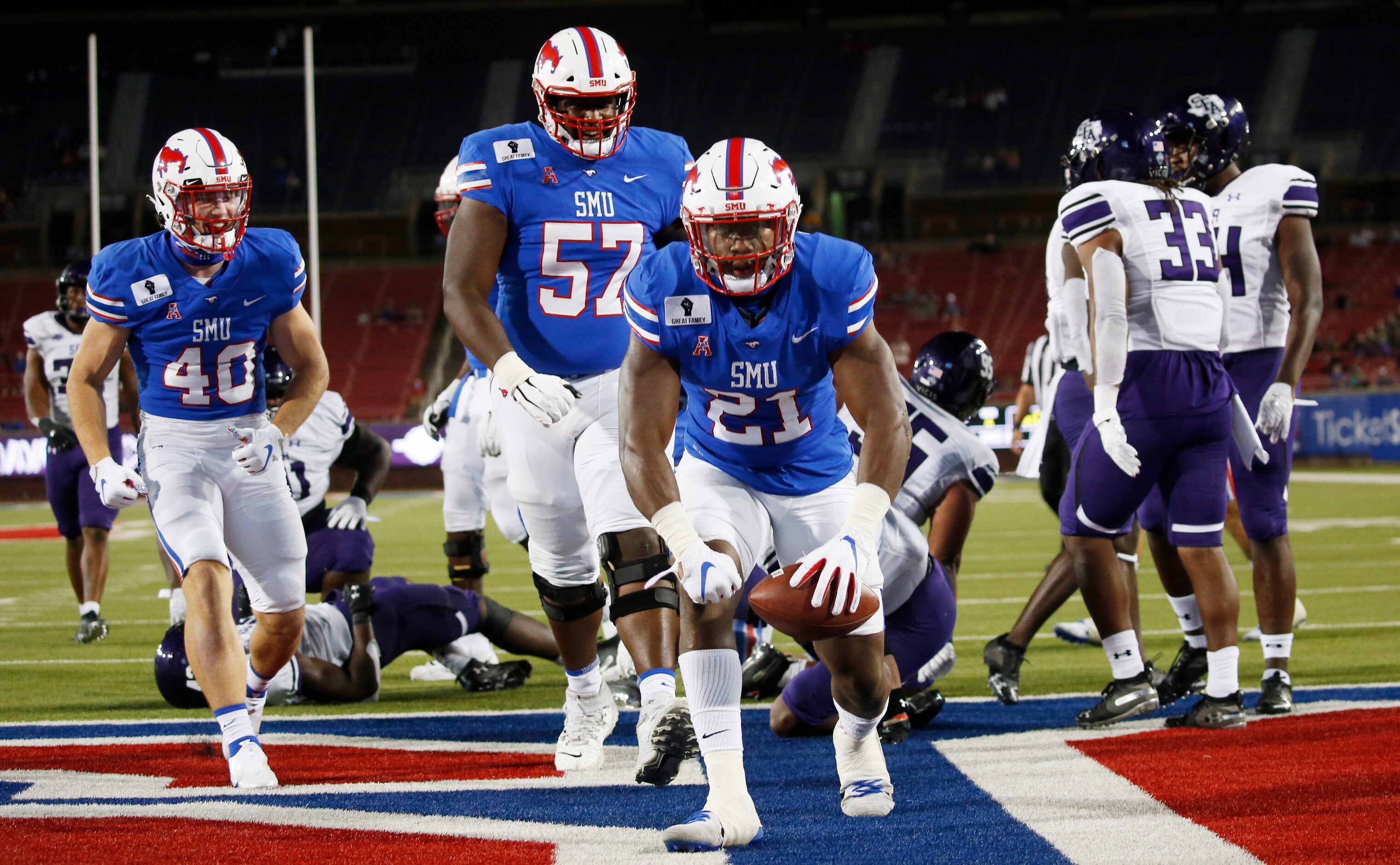 Southern Methodist Mustangs running back TaMerik Williams (21) celebrates a touchdown in the...