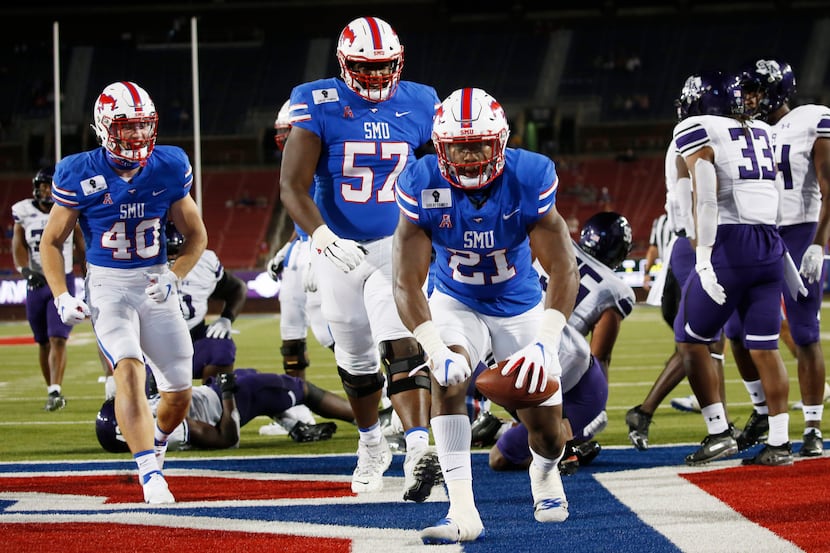 Southern Methodist Mustangs running back TaMerik Williams (21) celebrates a touchdown in the...