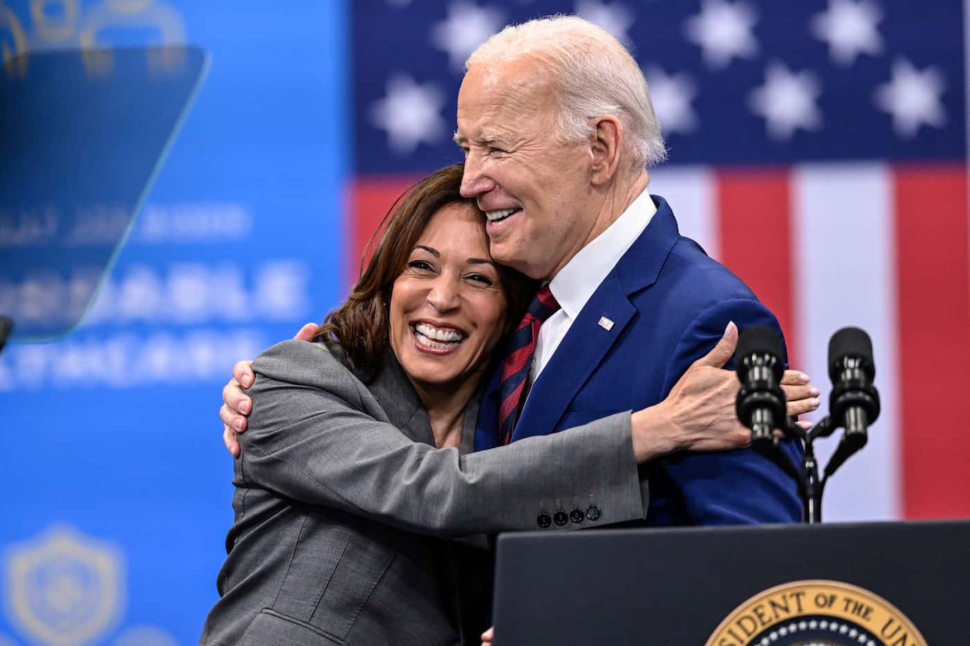 Vice President Kamala Harris embraces President Joe Biden after a speech on healthcare in...