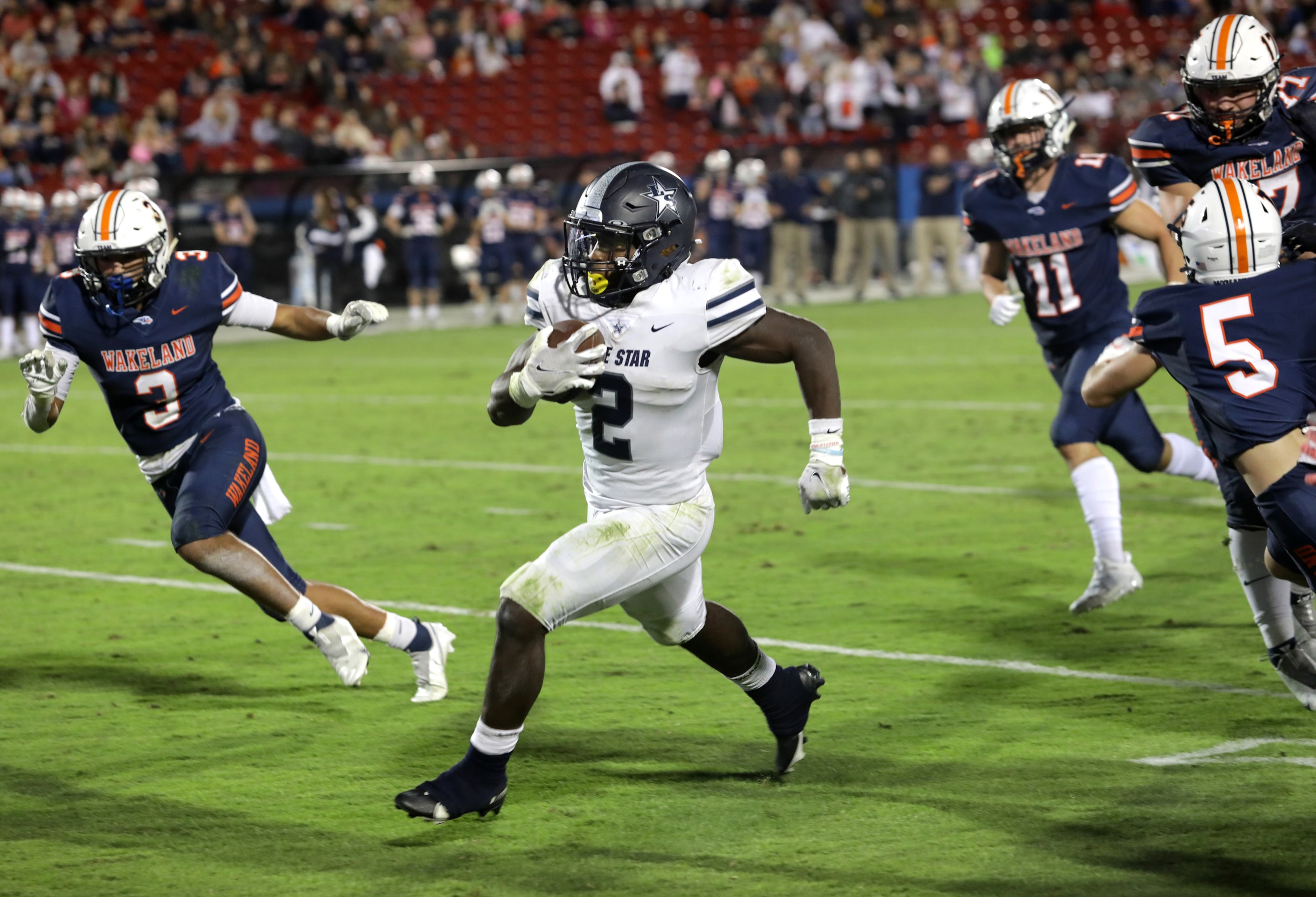 Lone Star player #2, Ashton Jeanty, finds a pocket as he runs for a touchdown during a...