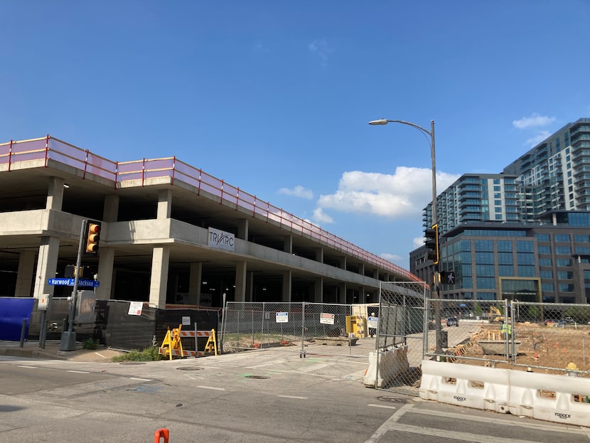 The apartments are being built on top of an existing garage structure at Harwood and Jackson...