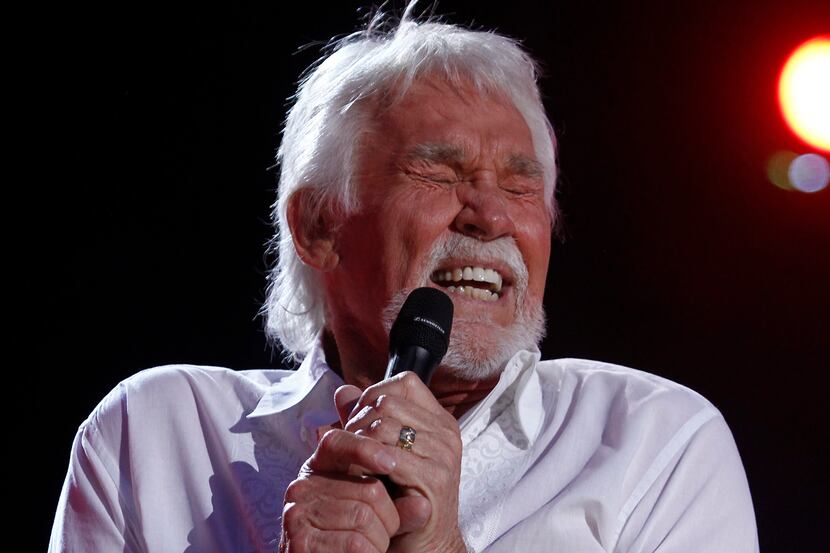 Kenny Rogers, shown performing at the 2012 CMA Music Festival in Nashville, Tenn., retired...