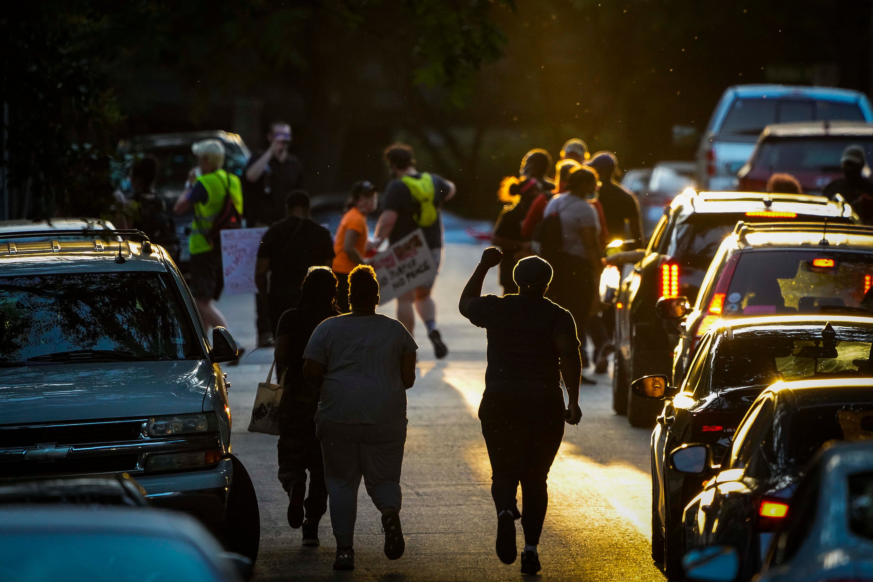 Marchers head down Elizabeth Street during a protest at Cole Park on Friday, June 5, 2020,...