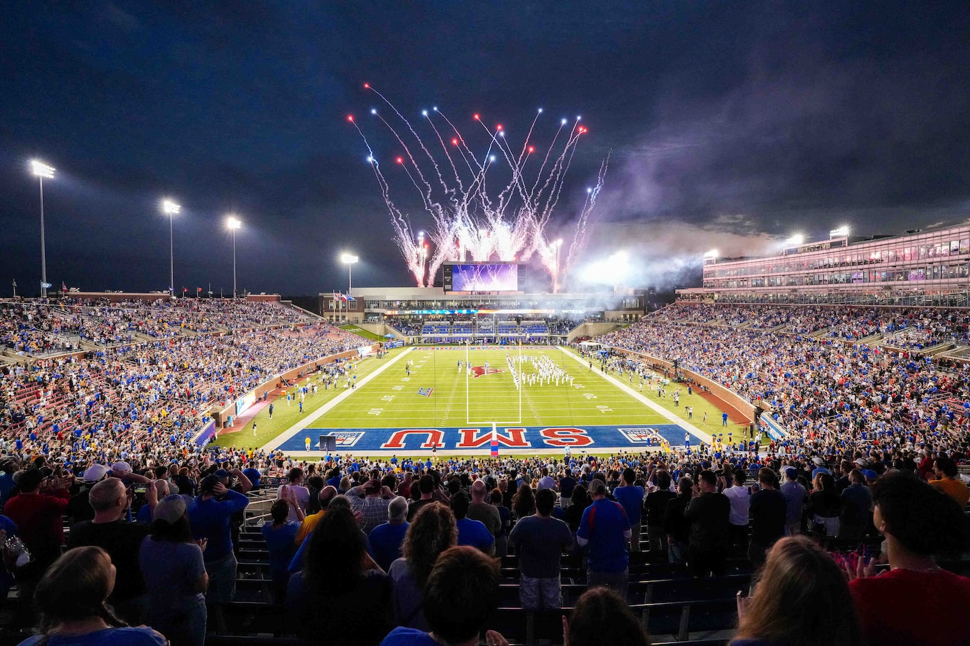 Fireworks explode during the national anthem before an NCAA football game between SMU and...