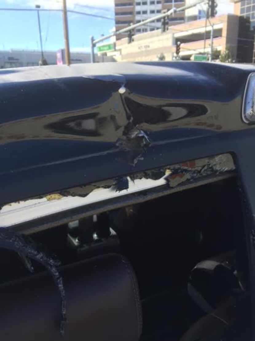 The crease and hole in the middle of  the roof of Gimenez's slightly-lifted truck. (Photo...