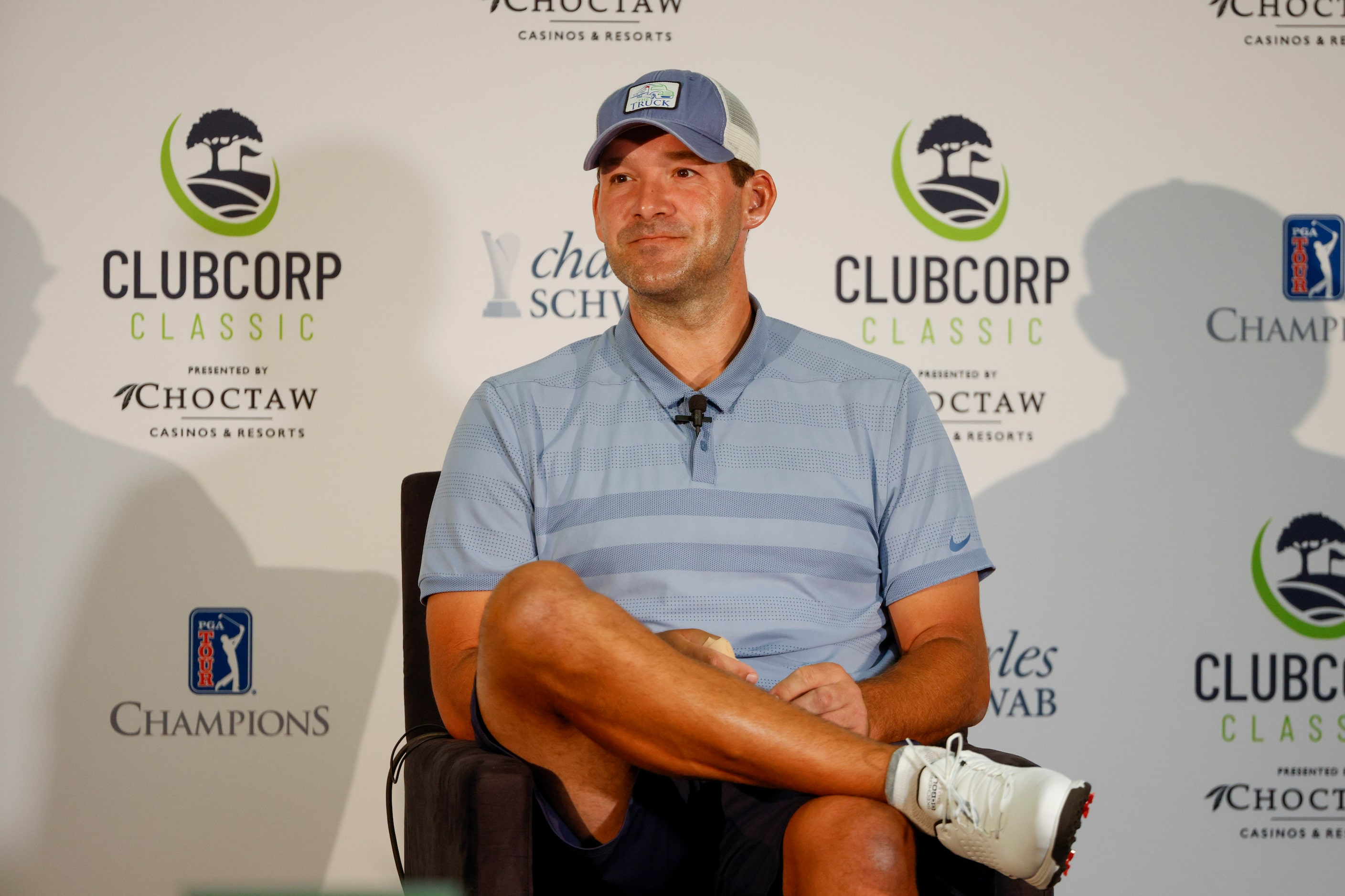 Former Dallas Cowboys quarterback Tony Romo listens to a question during a press conference...