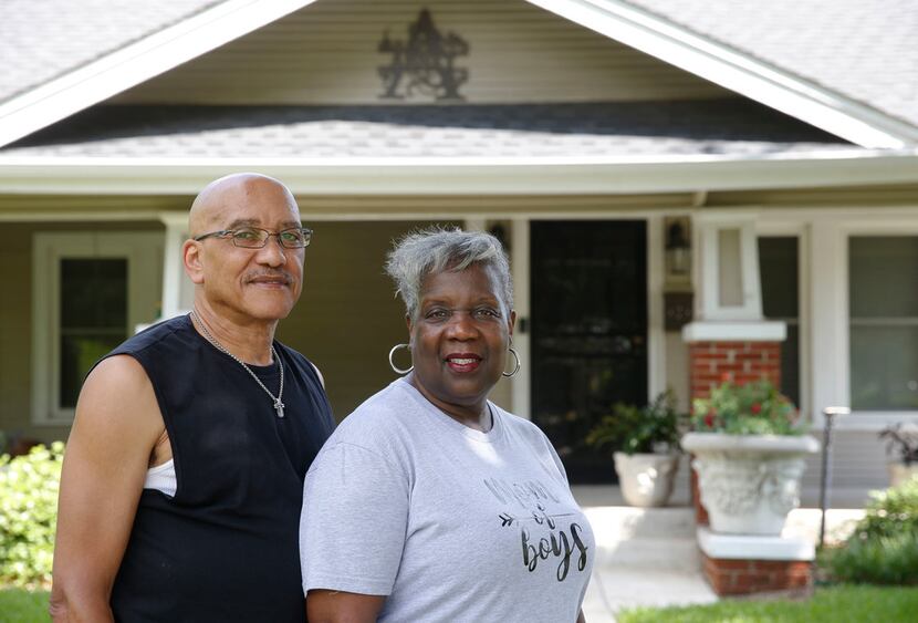 Arnold and Jackie Abney in front of their Park Row home of 24 years, only a few blocks away...