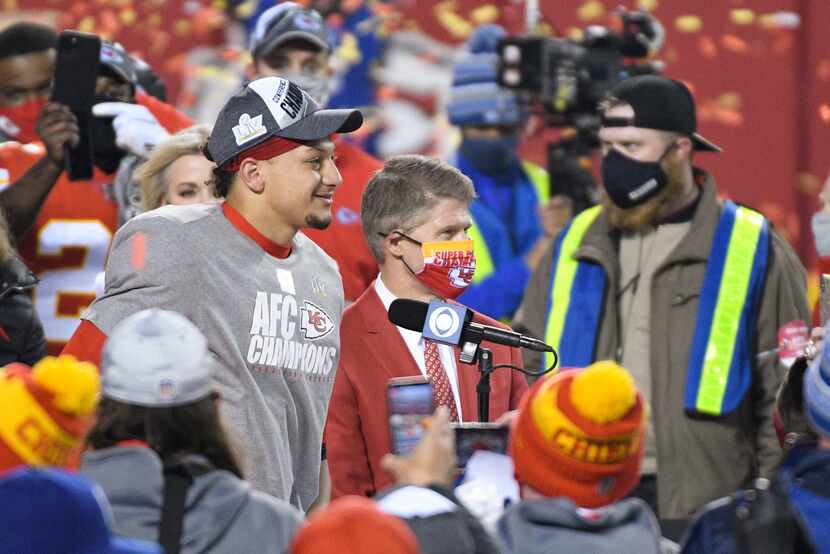 With team owner Clark Hunt beside him, Chiefs quarterback Patrick Mahomes gave an interview...