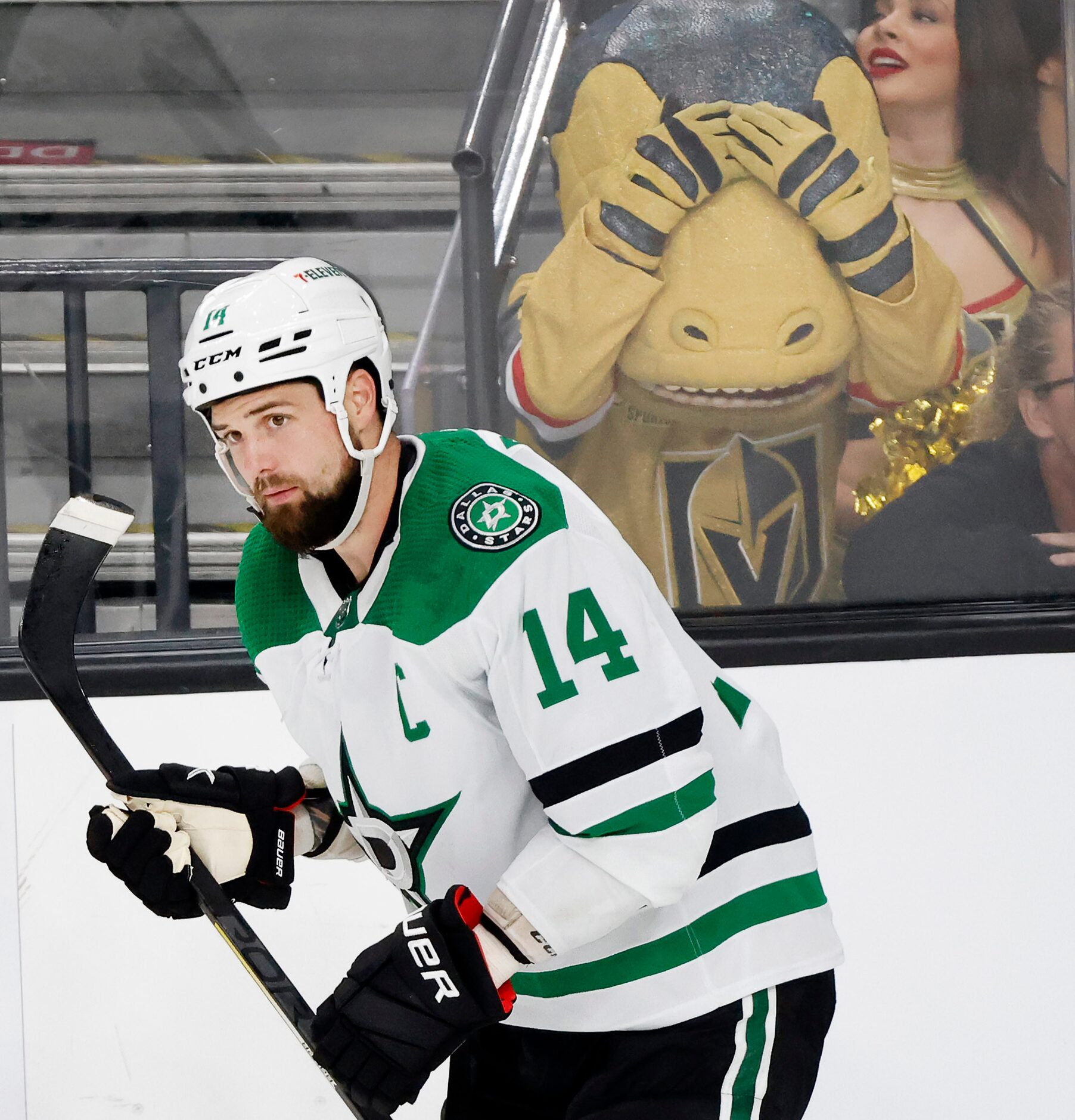 The Vegas Golden Knights mascot, Chance, reacts after Dallas Stars left wing Jamie Benn (14)...